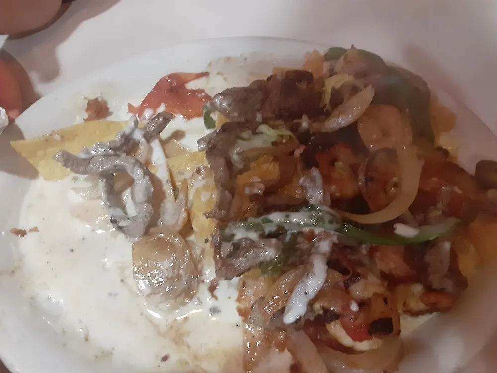 Shrimp Beef and Chicken Fajitas De Camaron